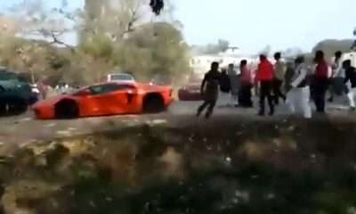 Lamborghini, Ferrari stoned by angry mod in India