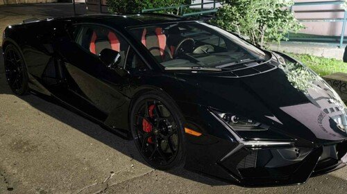 black Lamborghini Revuelto-overspeeding