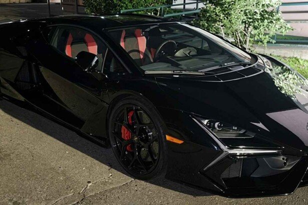 black Lamborghini Revuelto-overspeeding