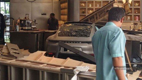 porsche crashed into a hotel in malaysia