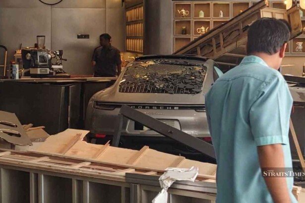 porsche crashed into a hotel in malaysia