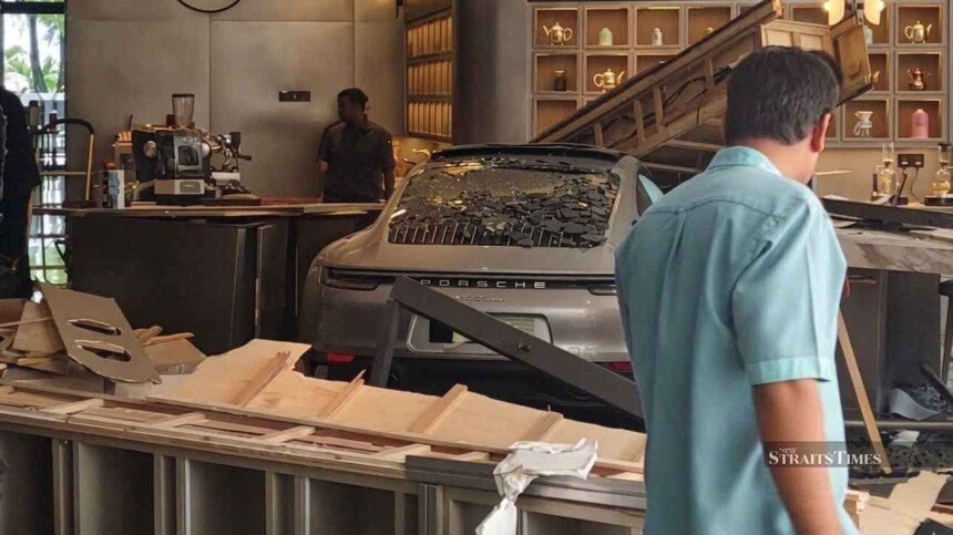 porsche crashed into a hotel in malaysia